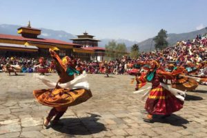 Mask Dancers performing sacred dances during Paro Tshechu Festival