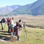 Observing birds in Phobjikha Valley