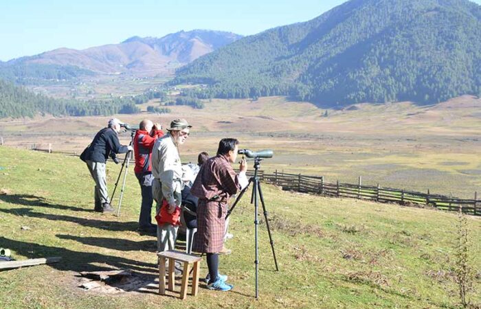 Observing birds in Phobjikha Valley